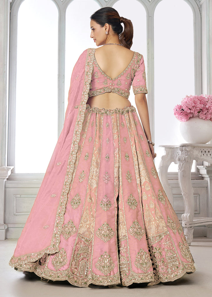 Buy Now Designer Pink Raw Silk Lehenga with Intricate Embroidered Detailing Online in US, UK, Canada, France, Italy, Greece, Sweden, UAE &amp; Worldwide at Empress.
