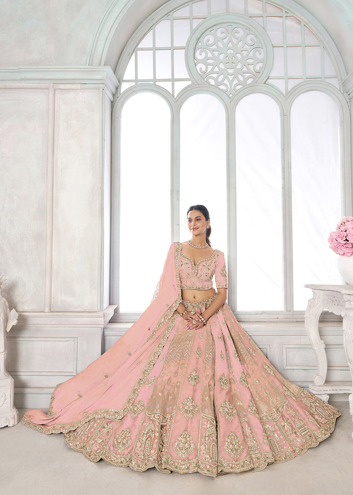 Buy Now Designer Pink Raw Silk Lehenga with Intricate Embroidered Detailing Online in US, UK, Canada, France, Italy, Greece, Sweden, UAE &amp; Worldwide at Empress.