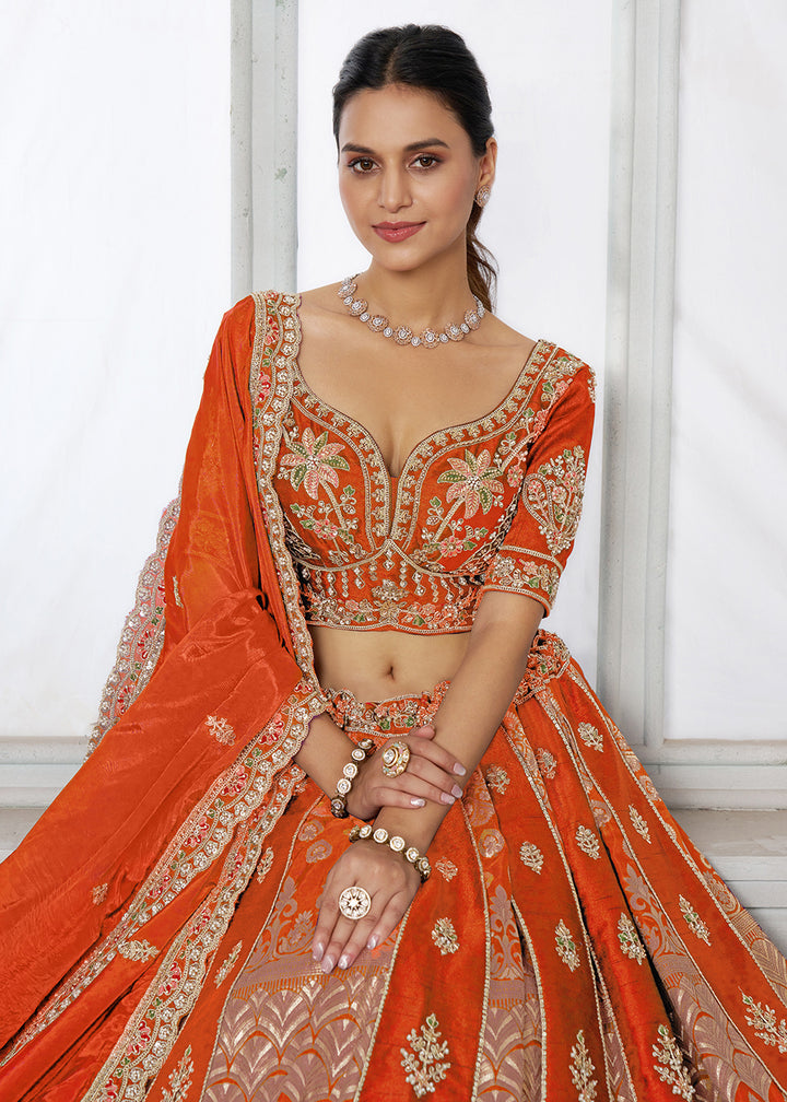 Buy Now Designer Orange Silk Lehenga with Intricate Embroidered Detailing Online in US, UK, Canada, France, Italy, Greece, Sweden, UAE &amp; Worldwide at Empress.