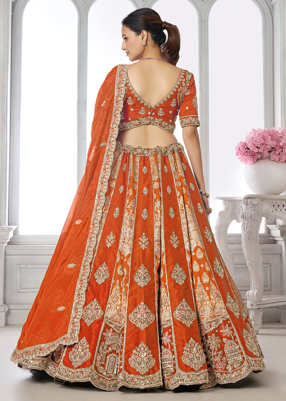 Buy Now Designer Orange Silk Lehenga with Intricate Embroidered Detailing Online in US, UK, Canada, France, Italy, Greece, Sweden, UAE &amp; Worldwide at Empress.