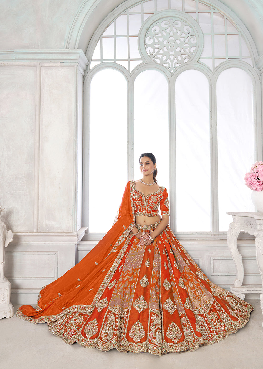 Buy Now Designer Orange Silk Lehenga with Intricate Embroidered Detailing Online in US, UK, Canada, France, Italy, Greece, Sweden, UAE &amp; Worldwide at Empress.