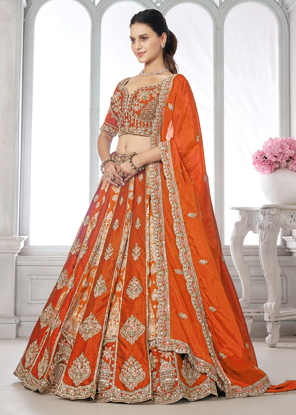 Buy Now Designer Orange Silk Lehenga with Intricate Embroidered Detailing Online in US, UK, Canada, France, Italy, Greece, Sweden, UAE &amp; Worldwide at Empress.