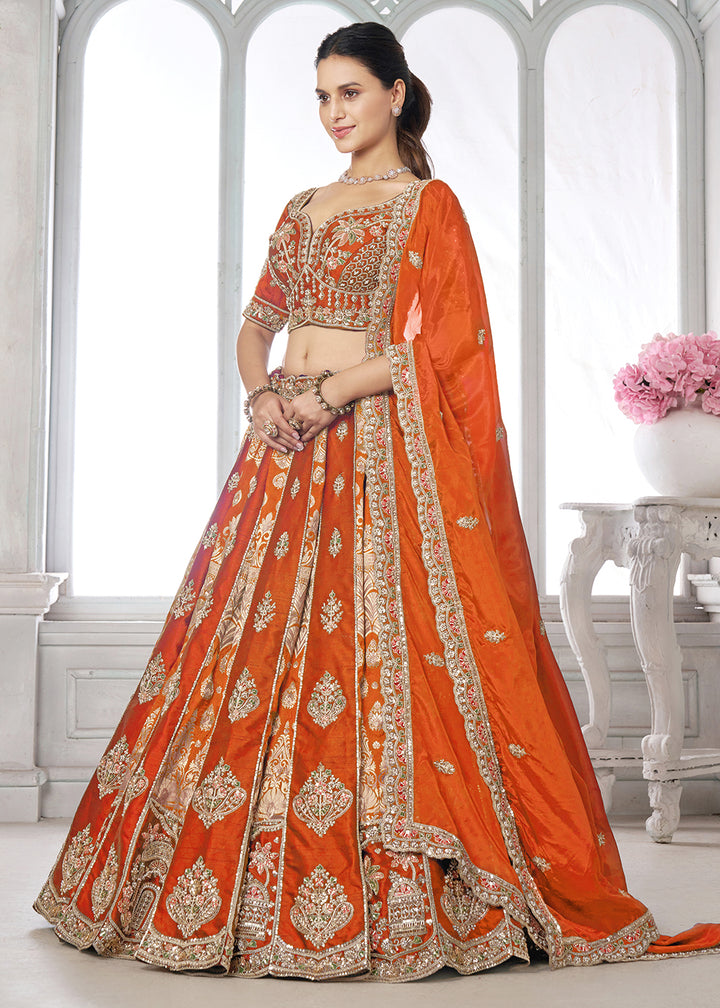 Buy Now Designer Orange Silk Lehenga with Intricate Embroidered Detailing Online in US, UK, Canada, France, Italy, Greece, Sweden, UAE &amp; Worldwide at Empress.