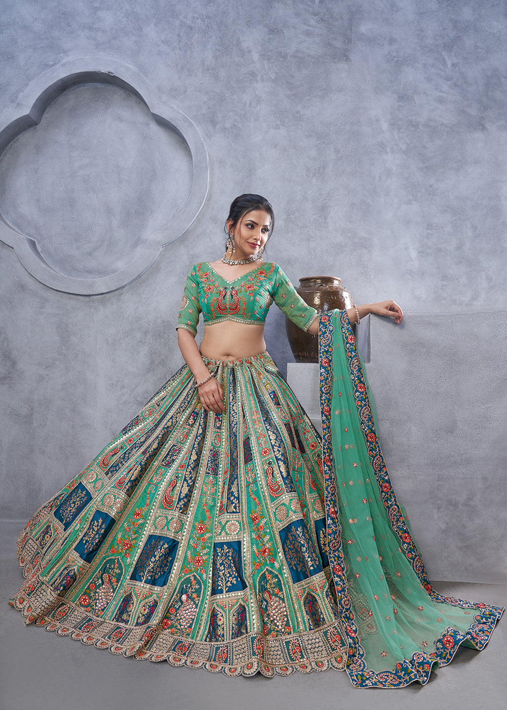 Buy Now Graceful Green Hand Embroidered Bridal Lehenga Choli Online in USA, UK, France, & Worldwide at Empress Clothing.