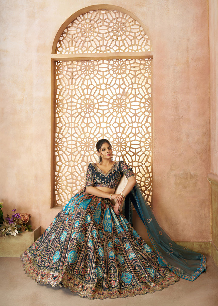 Buy Now Blue Banarasi Silk Aari Embroidered Bridal Lehenga Choli Online in USA, UK, Canada, France, Italy, Germany, Austria, UAE, Qatar & Worldwide at Empress.