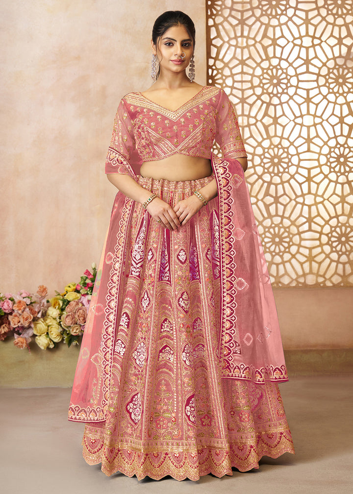 Buy Now Pink Banarasi Silk Aari Embroidered Bridal Lehenga Choli Online in USA, UK, Canada, France, Italy, Germany, Austria, UAE, Qatar & Worldwide at Empress.