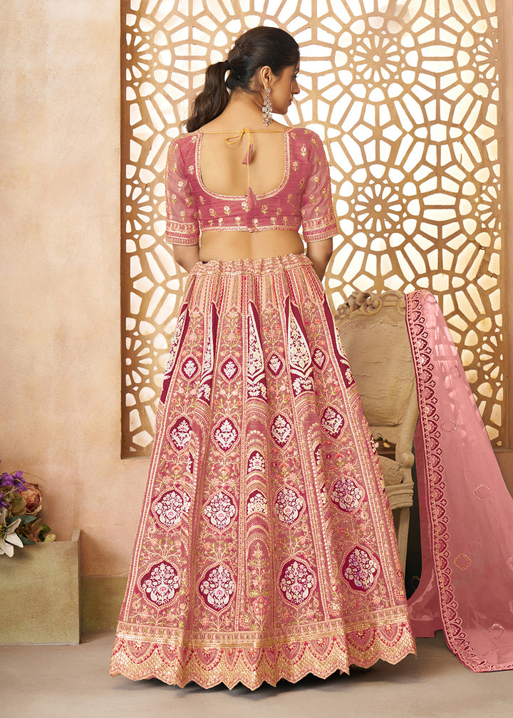 Buy Now Pink Banarasi Silk Aari Embroidered Bridal Lehenga Choli Online in USA, UK, Canada, France, Italy, Germany, Austria, UAE, Qatar & Worldwide at Empress.