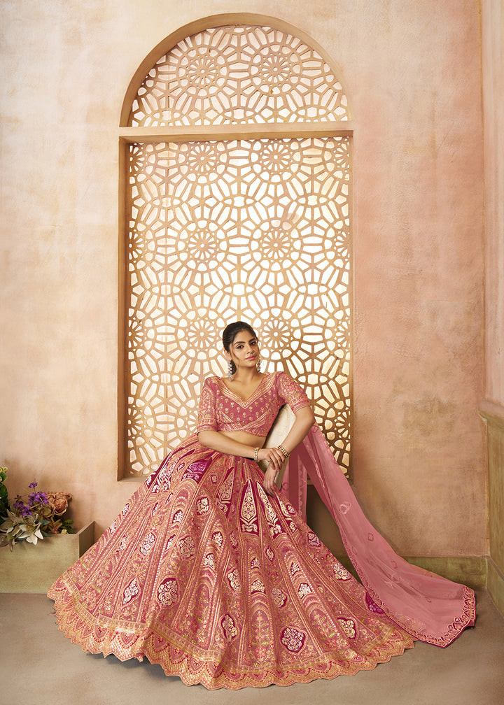 Buy Now Pink Banarasi Silk Aari Embroidered Bridal Lehenga Choli Online in USA, UK, Canada, France, Italy, Germany, Austria, UAE, Qatar & Worldwide at Empress.