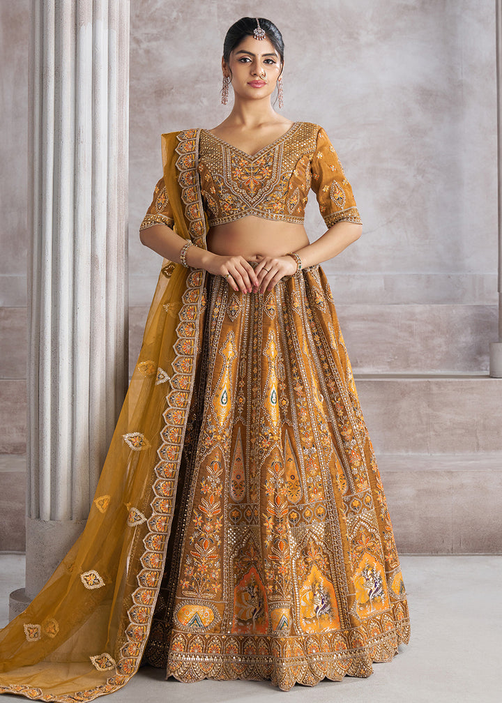 Buy Now Banarasi Silk Mustard Aari Embroidered Bridal Lehenga Choli Online in USA, UK, Canada, France, Italy, Germany, Austria, UAE & Worldwide at Empress.