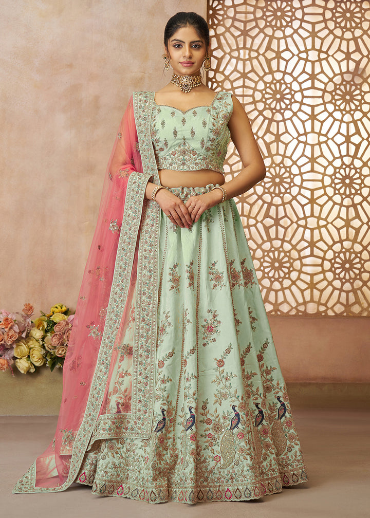 Buy Now Beautiful Green Zari Silk Embroidered Wedding Lehenga Choli Online in USA, UK, Canada, France, Italy, Germany, Austria, UAE & Worldwide at Empress.