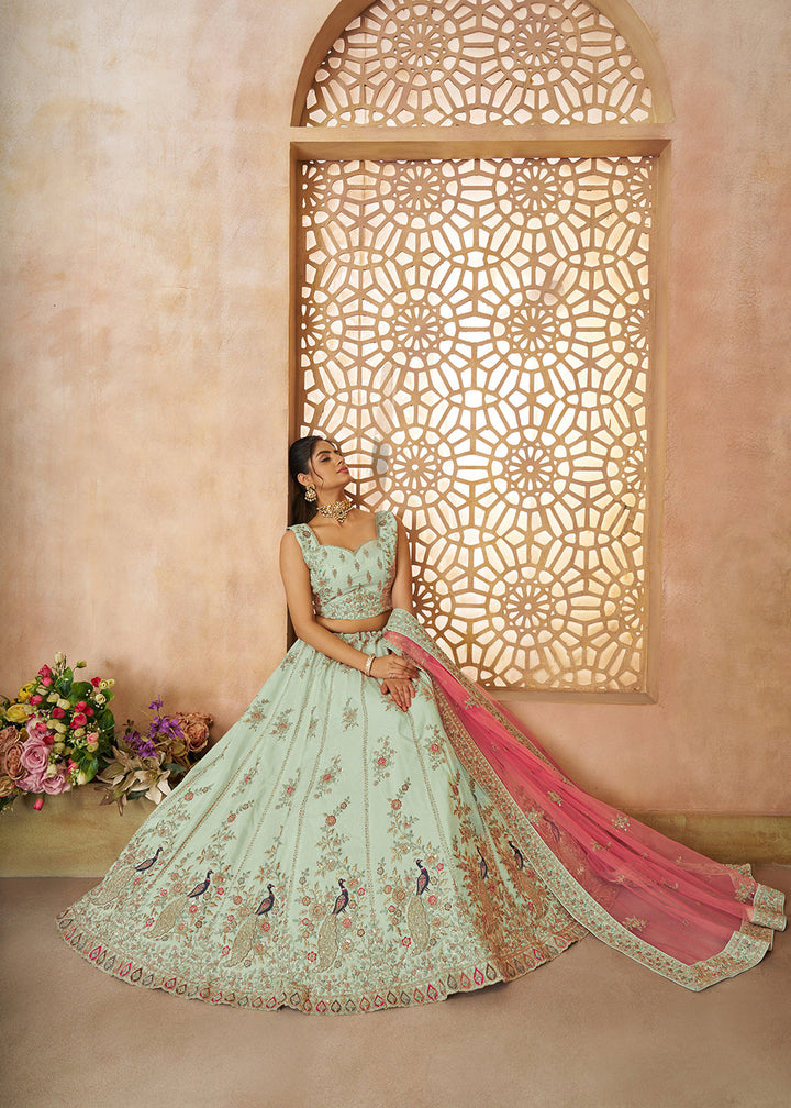 Buy Now Beautiful Green Zari Silk Embroidered Wedding Lehenga Choli Online in USA, UK, Canada, France, Italy, Germany, Austria, UAE & Worldwide at Empress.