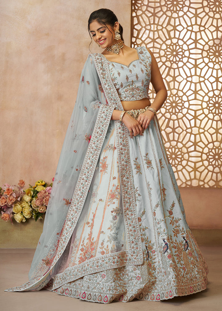 Buy Now Beautiful Sky Blue Zari Silk Embroidered Wedding Lehenga Choli Online in USA, UK, Canada, France, Italy, Germany, Austria, UAE & Worldwide at Empress.