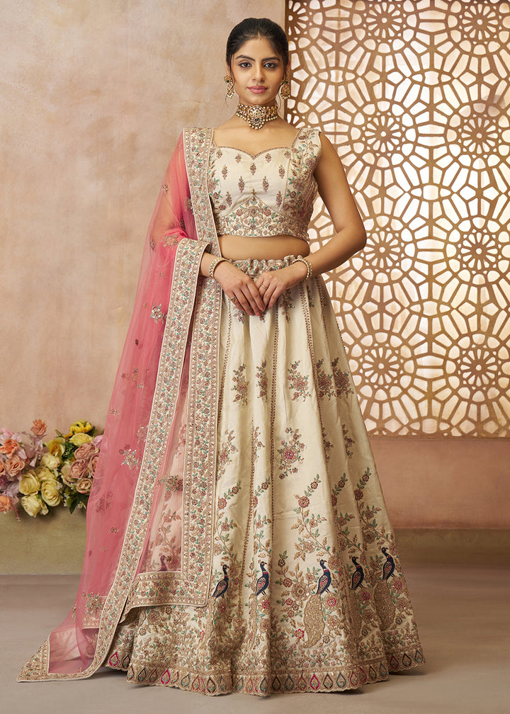 Buy Now Beautiful Beige Zari Silk Embroidered Wedding Lehenga Choli Online in USA, UK, Canada, France, Italy, Germany, Austria, UAE & Worldwide at Empress.