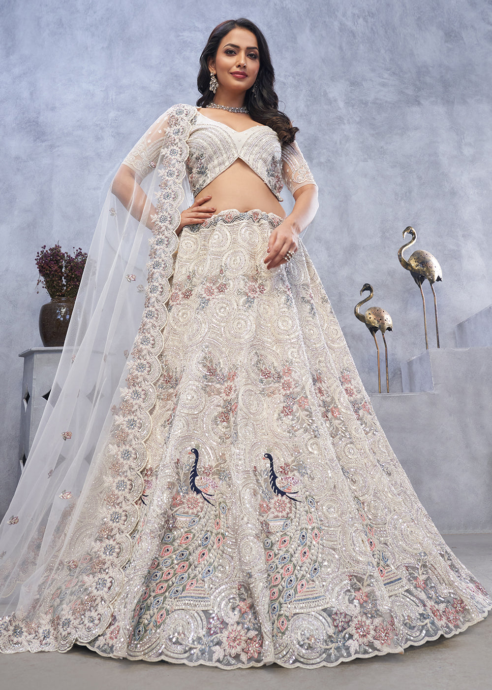 Buy Now Majestic Ivory Soft Net Embroidered Bridal Lehenga Choli Online in USA, UK, France, UAE & Worldwide at Empress Clothing. 