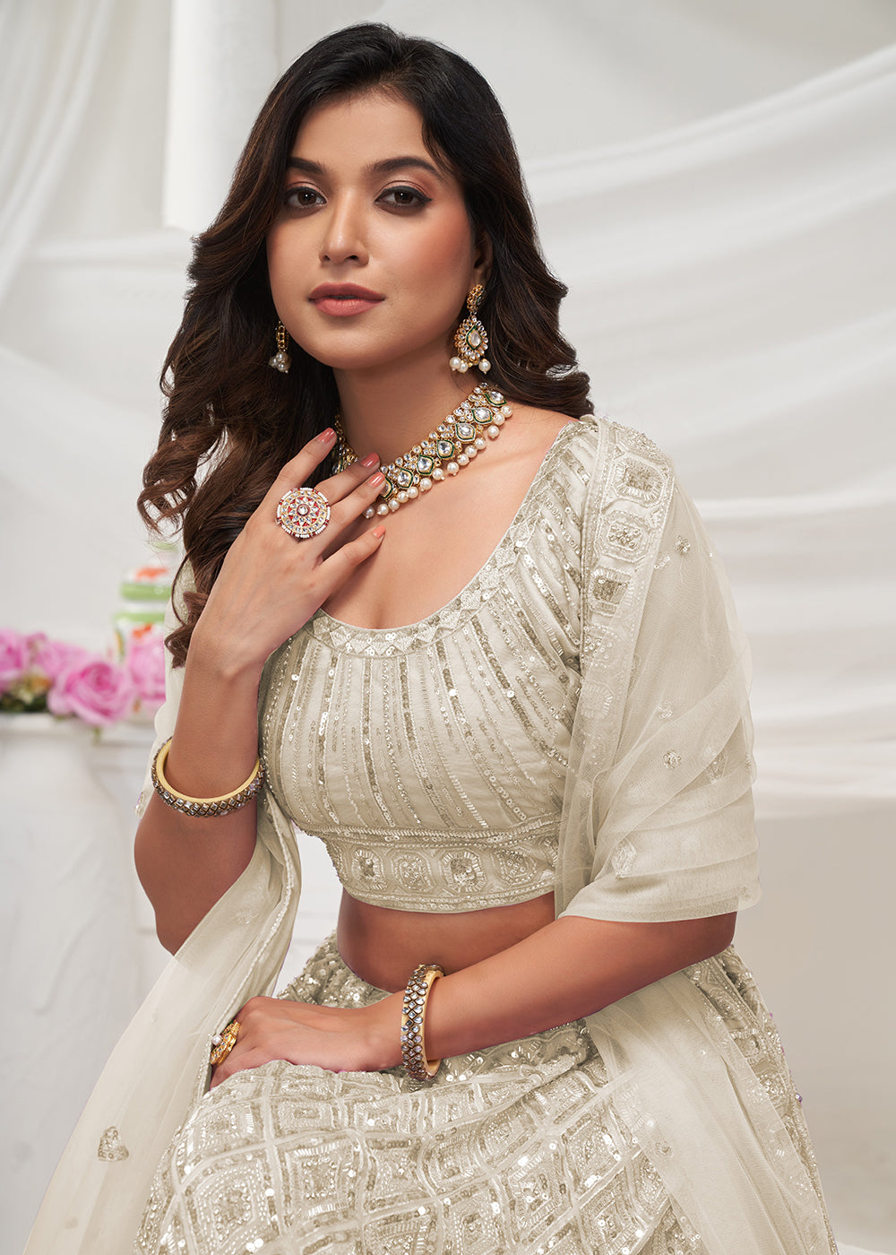Buy Now Pearled Ivory White Heavy Embroidered Bridal Lehenga Choli Online in USA, UK, Canada & Worldwide at Empress Clothing. 