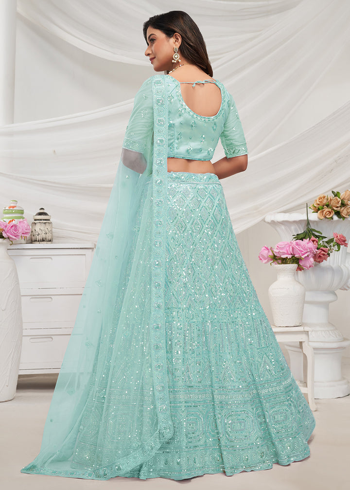 Buy Now Pearled Sky Blue Heavy Embroidered Bridal Lehenga Choli Online in USA, UK, Canada & Worldwide at Empress Clothing.