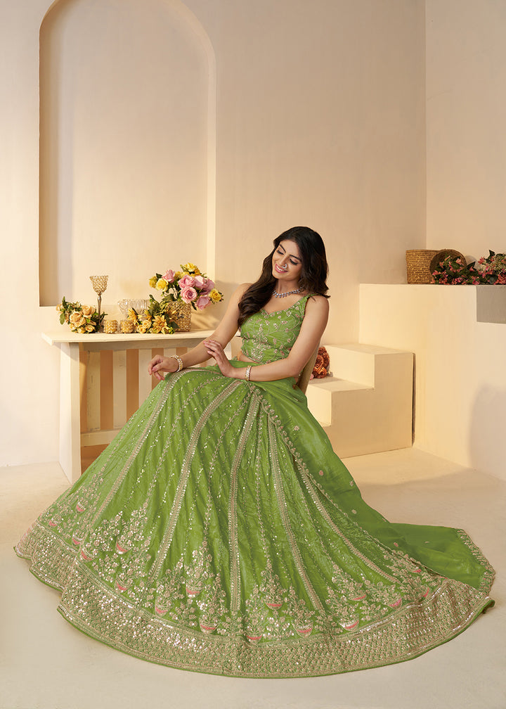 Buy Now Green Jimmy Choo Material Wedding Festive Lehenga Choli Online in USA, UK, Canada, France, Italy, Germany, Austria, UAE & Worldwide at Empress.