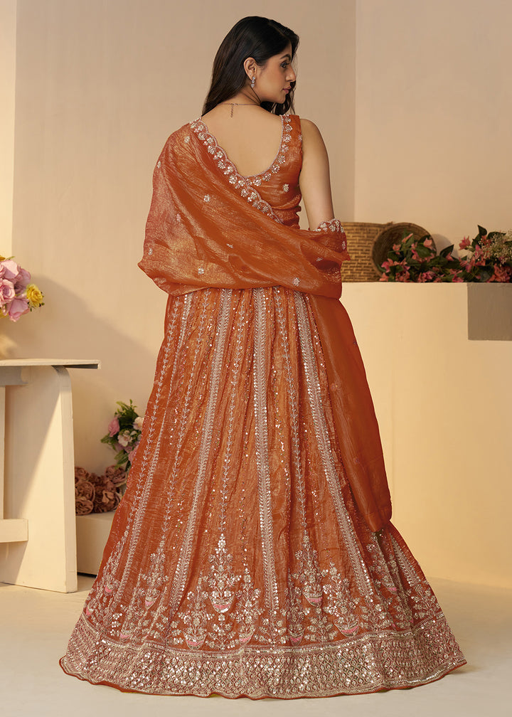 Buy Now Orange Jimmy Choo Material Wedding Festive Lehenga Choli Online in USA, UK, Canada, France, Italy, Germany, Austria, UAE & Worldwide at Empress.