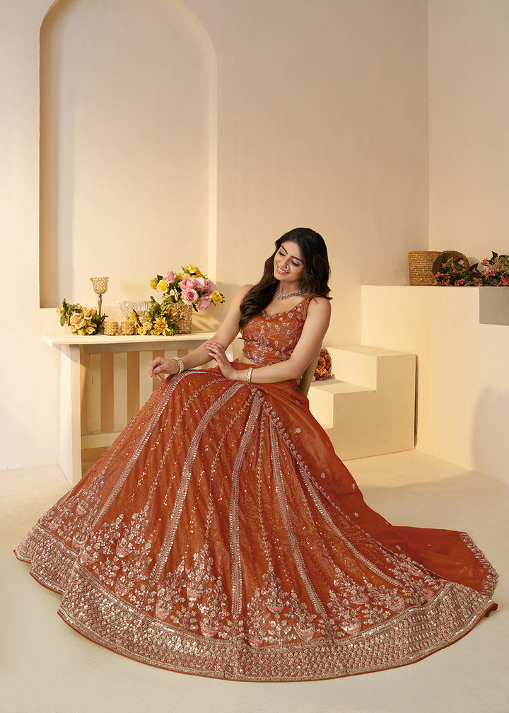 Buy Now Orange Jimmy Choo Material Wedding Festive Lehenga Choli Online in USA, UK, Canada, France, Italy, Germany, Austria, UAE & Worldwide at Empress.
