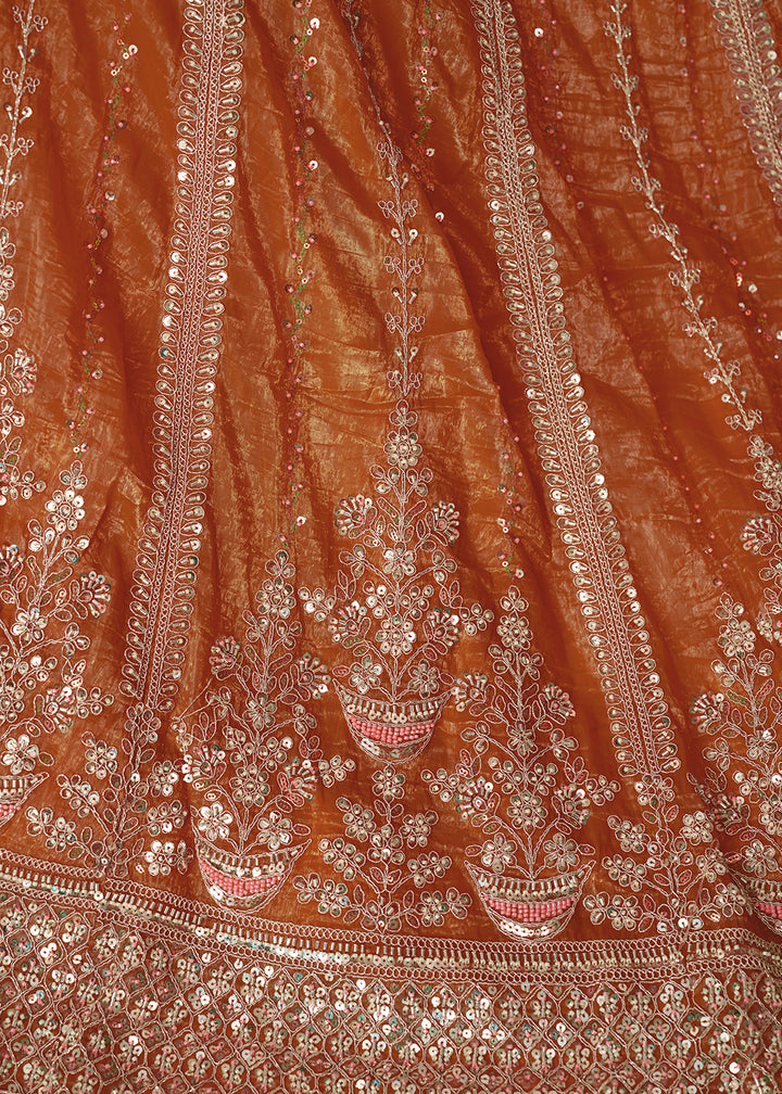 Buy Now Orange Jimmy Choo Material Wedding Festive Lehenga Choli Online in USA, UK, Canada, France, Italy, Germany, Austria, UAE & Worldwide at Empress.