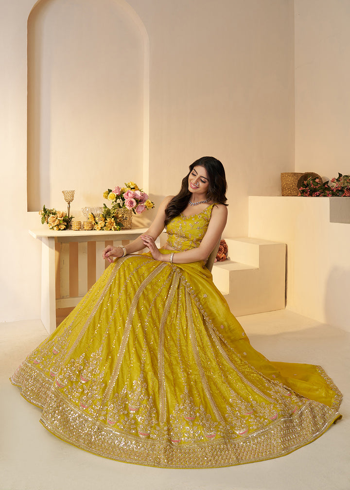 Buy Now Yellow Jimmy Choo Material Wedding Festive Lehenga Choli Online in USA, UK, Canada, France, Italy, Germany, Austria, UAE & Worldwide at Empress.