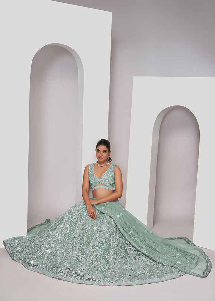 Buy Now Luxurious Sky Blue Heavy Embroidered Bridal Lehenga Choli Online in USA, UK, Canada & Worldwide at Empress Clothing.