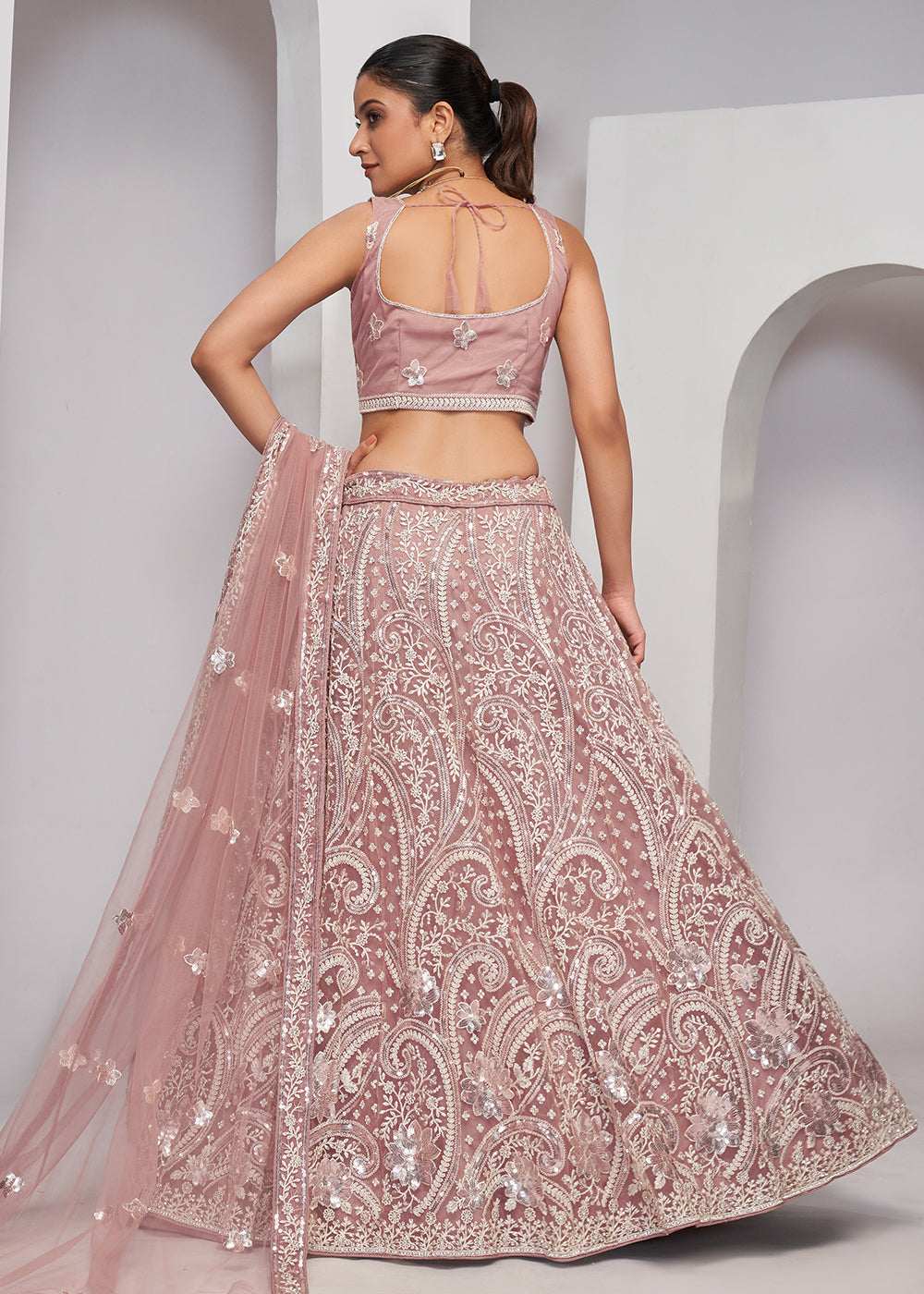 Buy Now Luxurious Chickoo Peach Heavy Embroidered Bridal Lehenga Choli Online in USA, UK, Canada & Worldwide at Empress Clothing. 