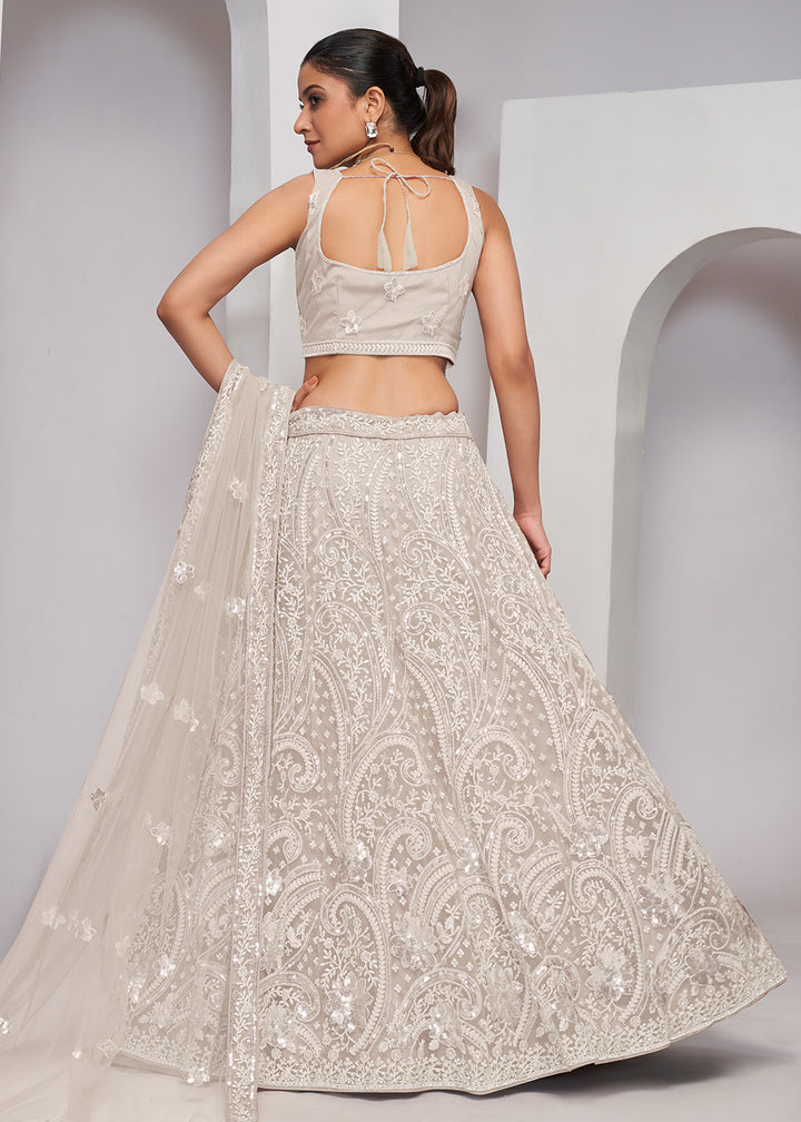 Buy Now Luxurious Ivory Heavy Embroidered Bridal Lehenga Choli Online in USA, UK, Canada & Worldwide at Empress Clothing.