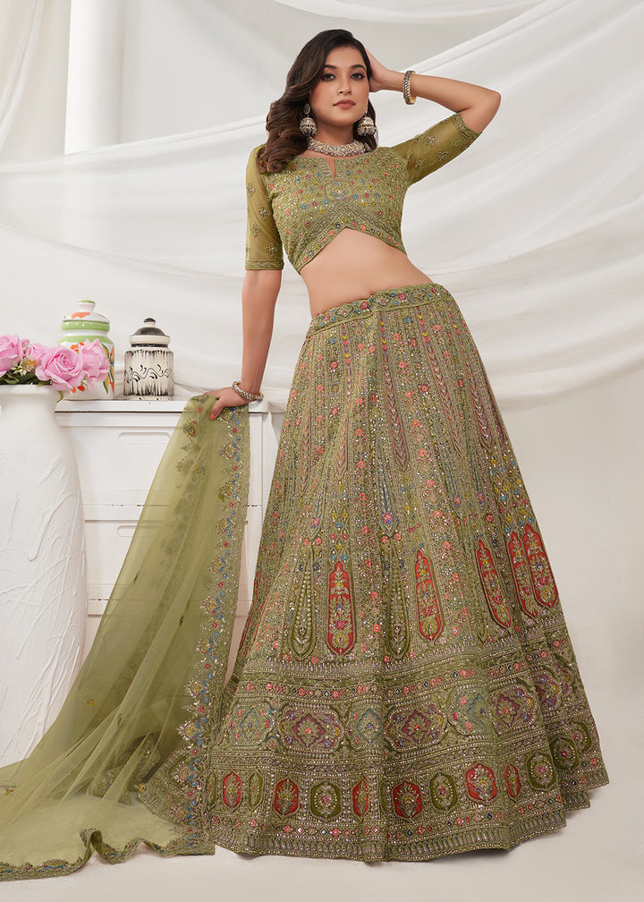 Buy Now Soft Net Green Heavy Embroidered Bridal Style Lehenga Choli Online in USA, UK, Canada & Worldwide at Empress Clothing.