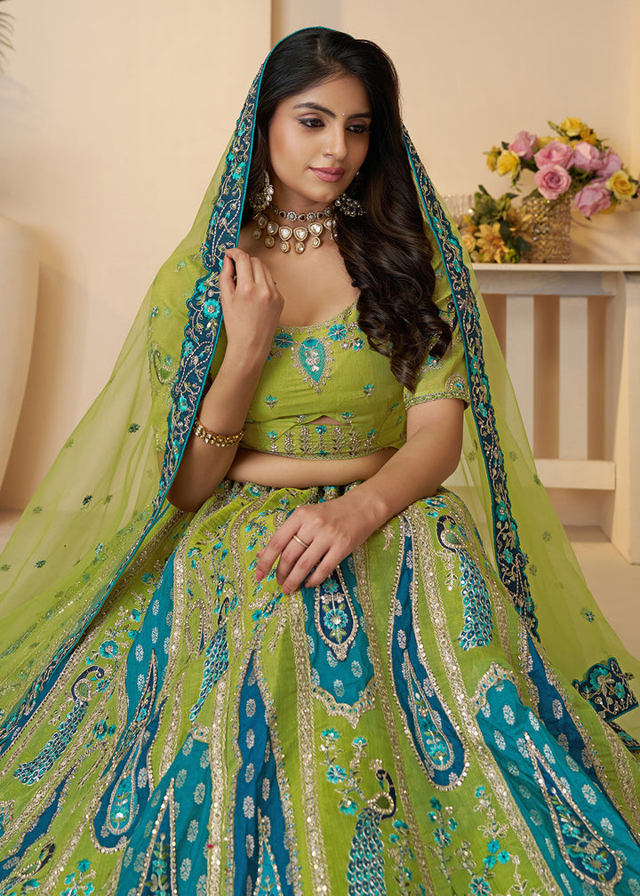 Buy Now Banarasi Silk Green Embroidered Wedding Festive Lehenga Choli Online in USA, UK, Canada, France, Italy, Germany, Austria, UAE & Worldwide at Empress.