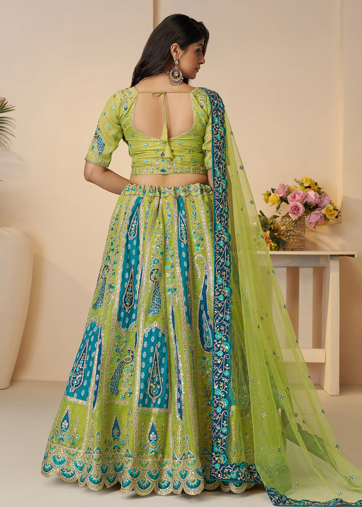 Buy Now Banarasi Silk Green Embroidered Wedding Festive Lehenga Choli Online in USA, UK, Canada, France, Italy, Germany, Austria, UAE & Worldwide at Empress.