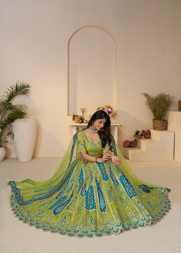 Buy Now Banarasi Silk Green Embroidered Wedding Festive Lehenga Choli Online in USA, UK, Canada, France, Italy, Germany, Austria, UAE & Worldwide at Empress.