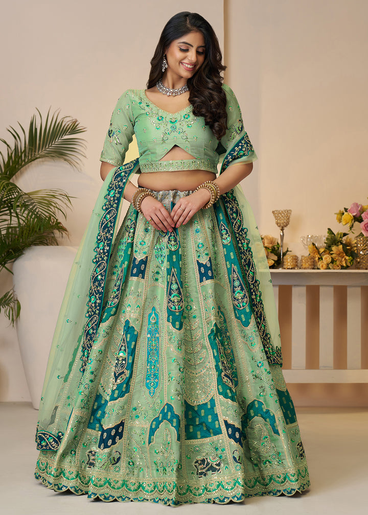 Buy Now Green Banarasi Silk Embroidered Wedding Festive Lehenga Choli Online in USA, UK, Canada, France, Italy, Germany, Austria, UAE & Worldwide at Empress.