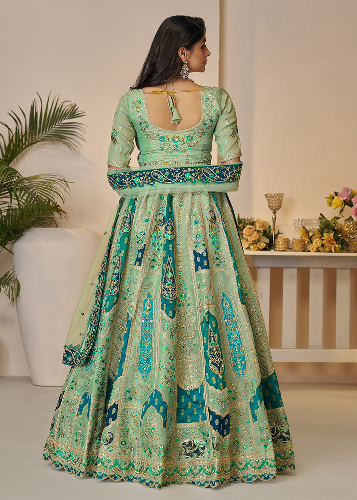 Buy Now Green Banarasi Silk Embroidered Wedding Festive Lehenga Choli Online in USA, UK, Canada, France, Italy, Germany, Austria, UAE & Worldwide at Empress.