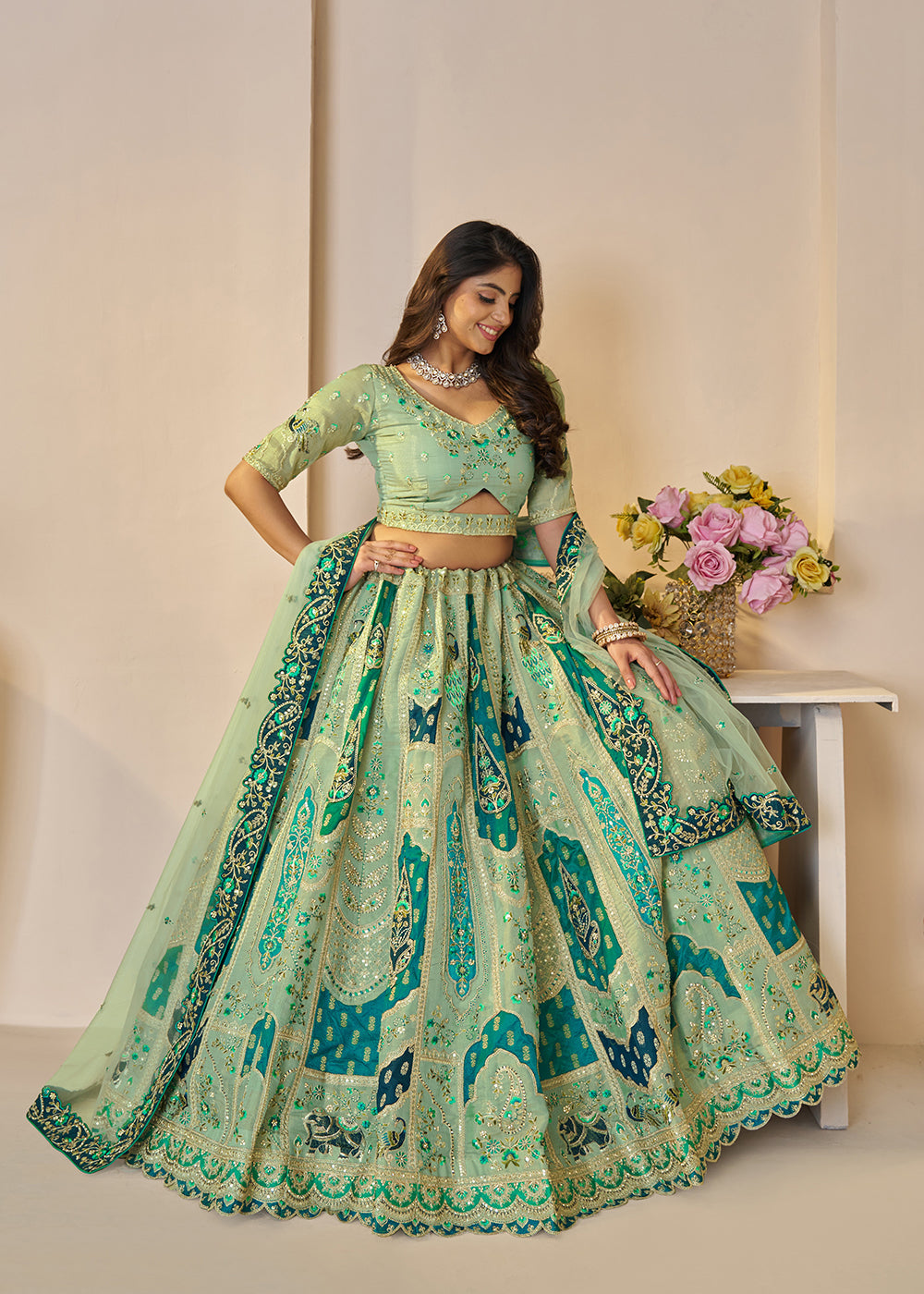 Buy Now Green Banarasi Silk Embroidered Wedding Festive Lehenga Choli Online in USA, UK, Canada, France, Italy, Germany, Austria, UAE & Worldwide at Empress.