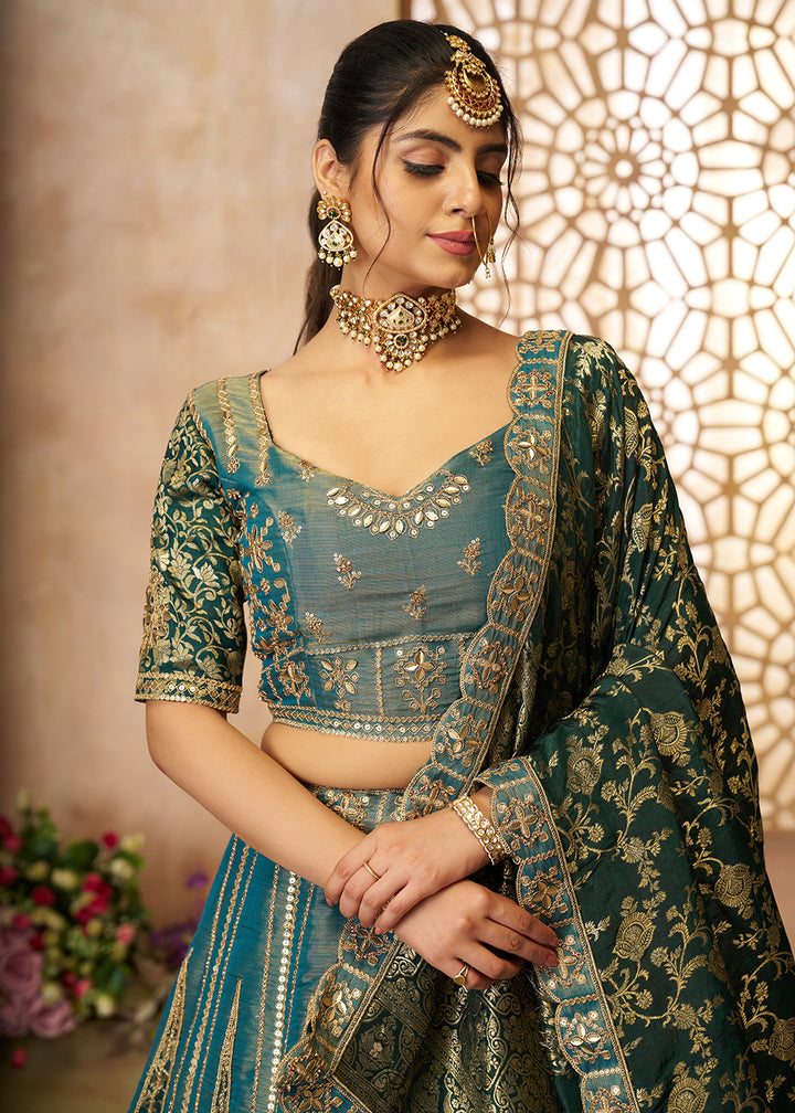 Buy Now Green Tissue Net Heavy Embroidered Bridal Lehenga Choli Online in USA, UK, Canada, France, Italy, Germany, Austria, UAE & Worldwide at Empress Clothing.