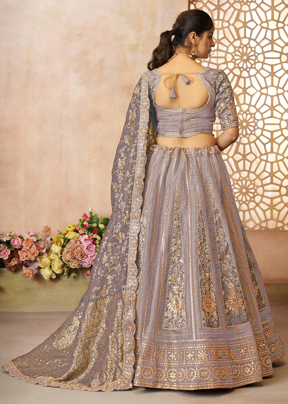 Buy Now Mauve Tissue Net Heavy Embroidered Bridal Lehenga Choli Online in USA, UK, Canada, France, Italy, Germany, Austria, UAE & Worldwide at Empress Clothing.