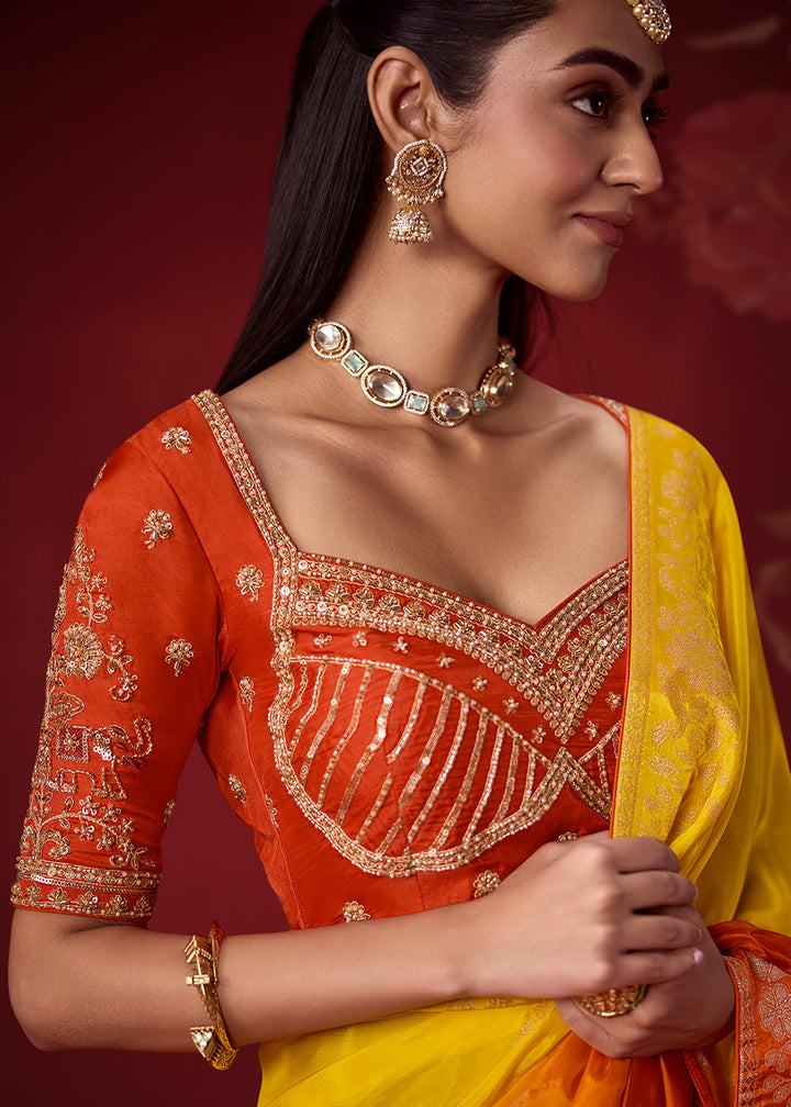 Buy Now Rich Yellow &amp; Orange Dola Crape Silk Festive Designer Saree Online in US, UK, Canada, France, Germany, Denmark, Sweden, Austria &amp; Worldwide at Empress.
