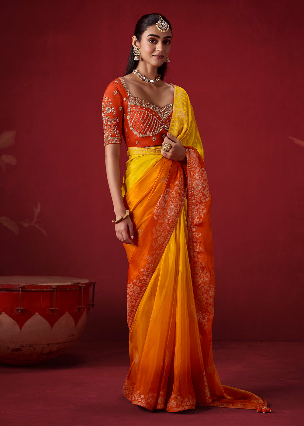 Buy Now Rich Yellow &amp; Orange Dola Crape Silk Festive Designer Saree Online in US, UK, Canada, France, Germany, Denmark, Sweden, Austria &amp; Worldwide at Empress.