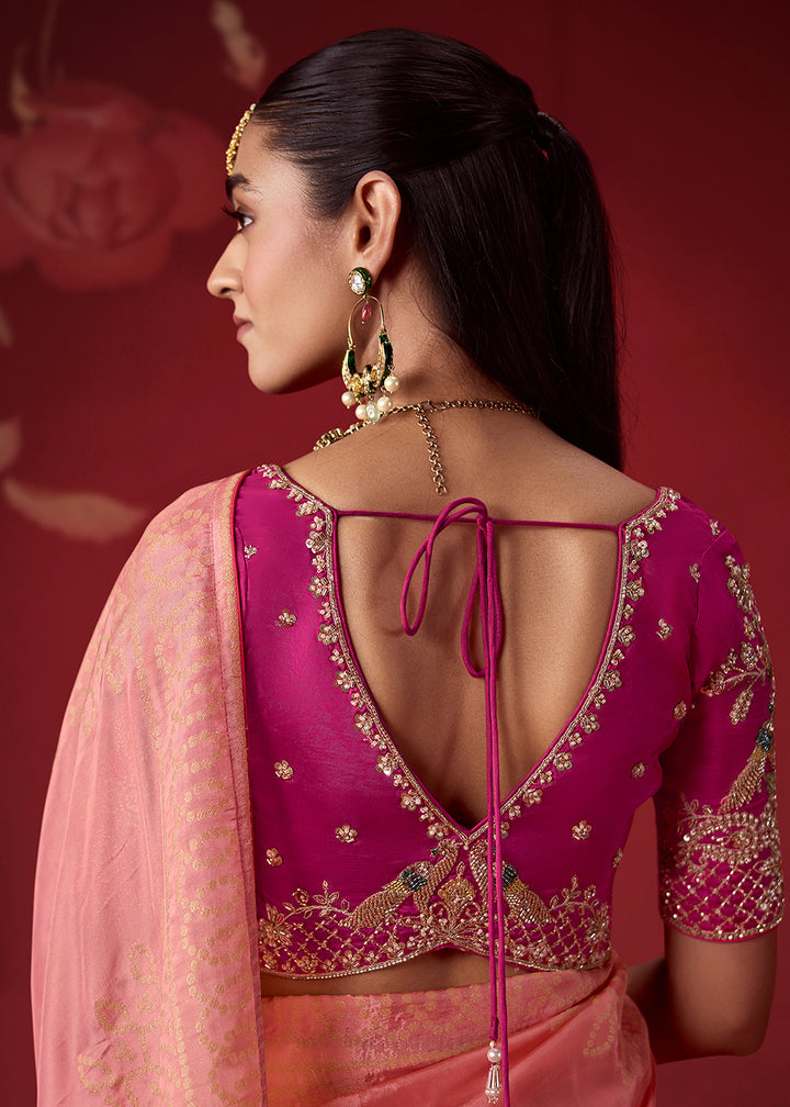 Buy Now Rich Peach &amp; Pink Dola Crape Silk Festive Designer Saree Online in US, UK, Canada, France, Germany, Denmark, Sweden, Austria &amp; Worldwide at Empress.