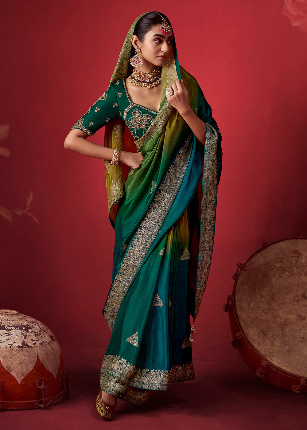 Buy Now Rich Dark Green Dola Crape Silk Festive Designer Saree Online in US, UK, Canada, France, Germany, Denmark, Sweden, Austria &amp; Worldwide at Empress.