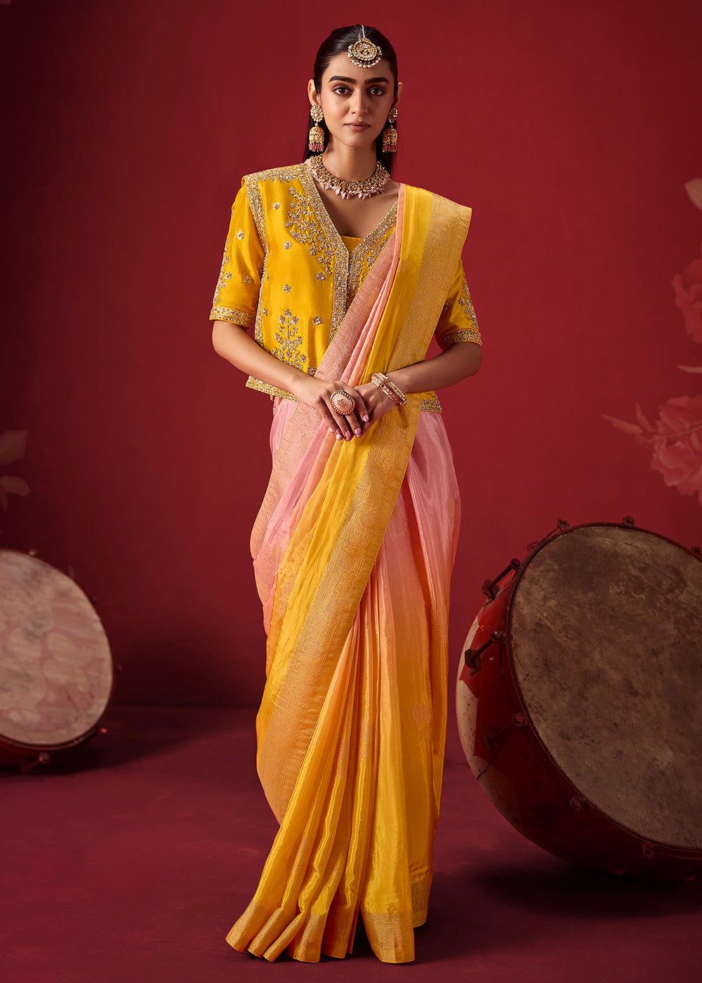 Buy Now Rich Yellow &amp; Pink Dola Crape Silk Festive Designer Saree Online in US, UK, Canada, France, Germany, Denmark, Sweden, Austria &amp; Worldwide at Empress.