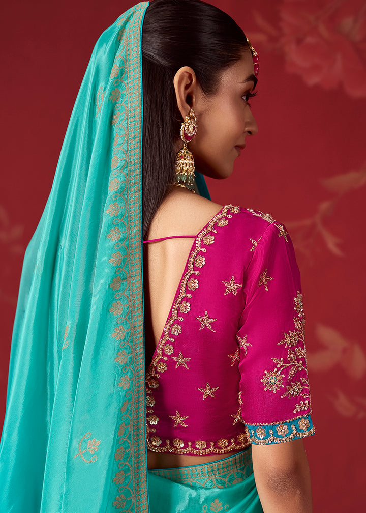 Buy Now Rich Shaded Sea Blue Dola Crape Silk Festive Designer Saree Online in US, UK, Canada, France, Germany, Denmark, Sweden, Austria &amp; Worldwide at Empress.