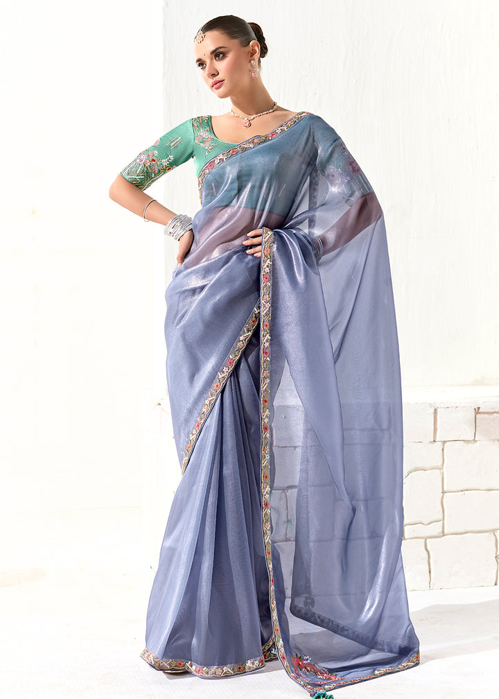 Buy Fabulous Periwinkle Organza Tissue Embroidered Designer Saree Online in USA, UK, Canada, Spain, France, Germany, Italy, Austria, UAE & Worldwide at Empress.