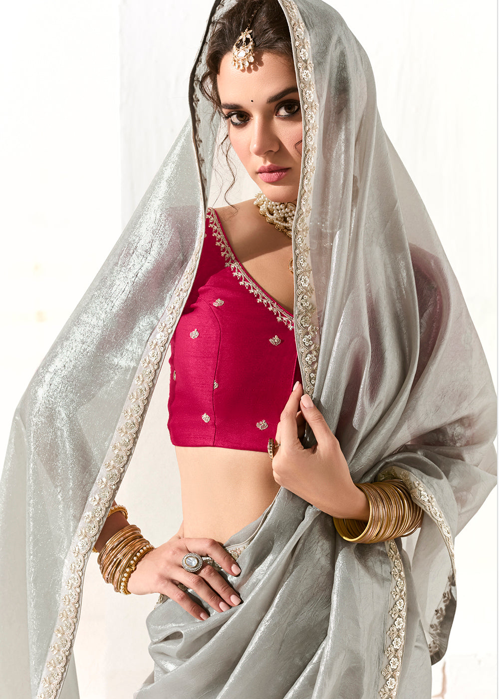 Buy Fabulous Silver Organza Tissue Embroidered Designer Saree Online in USA, UK, Canada, Spain, France, Germany, Italy, Austria, UAE & Worldwide at Empress.