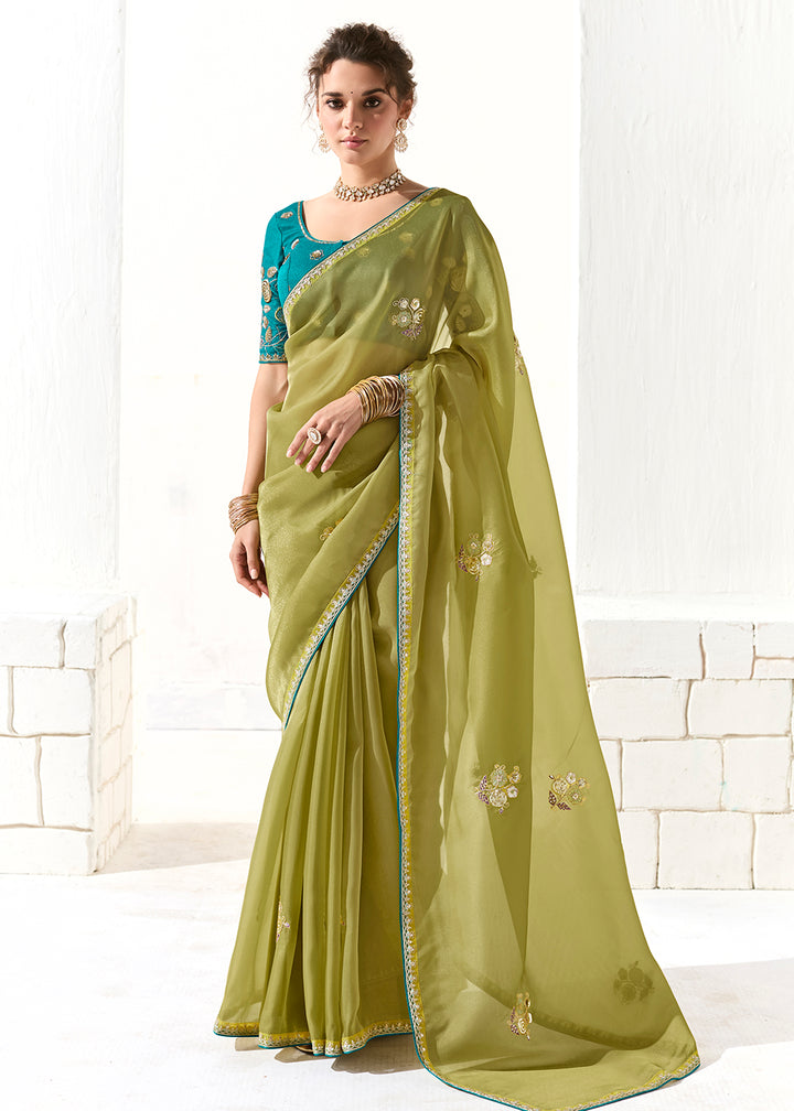 Buy Fabulous Pista Green Organza Tissue Embroidered Designer Saree Online in USA, UK, Canada, Spain, France, Germany, Italy, Austria, UAE & Worldwide at Empress.