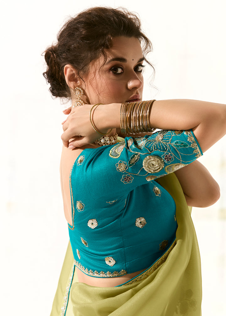 Buy Fabulous Pista Green Organza Tissue Embroidered Designer Saree Online in USA, UK, Canada, Spain, France, Germany, Italy, Austria, UAE & Worldwide at Empress.