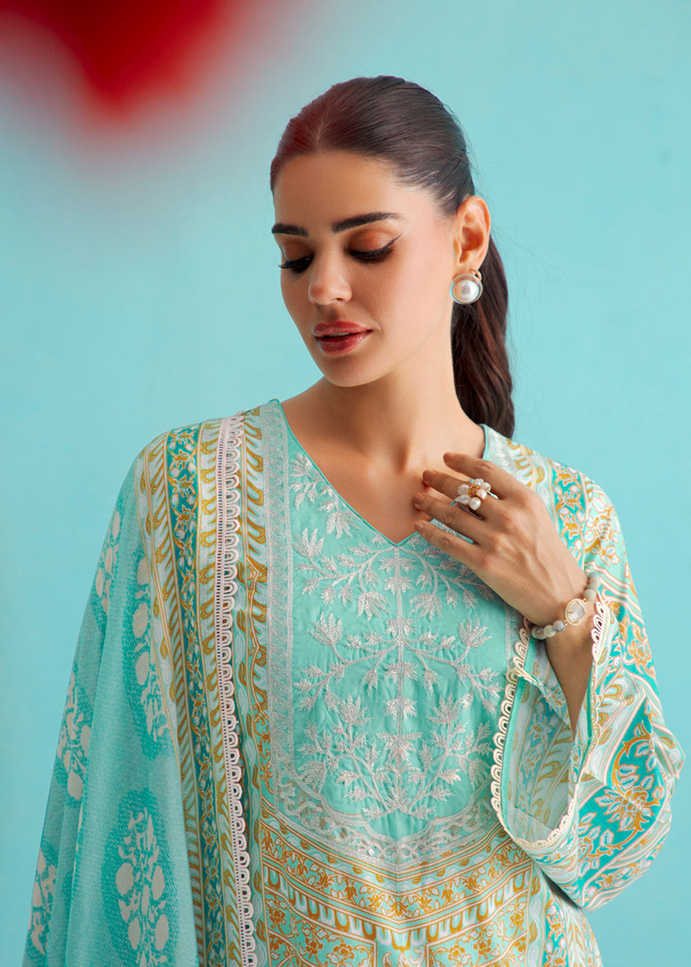 Buy Now Gorgeous Turquoise Lawn Embroidered Festive Salwar Suit Online in USA, UK, Canada, Germany, Italy, France, Austria, UAE & Worldwide at Empress Clothing.