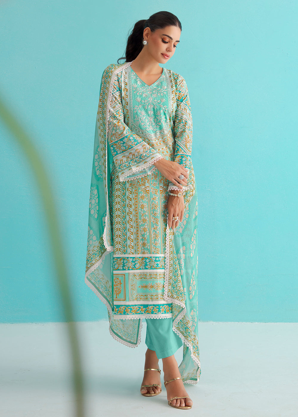 Buy Now Gorgeous Turquoise Lawn Embroidered Festive Salwar Suit Online in USA, UK, Canada, Germany, Italy, France, Austria, UAE & Worldwide at Empress Clothing.