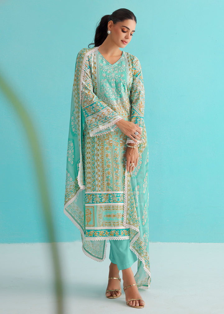 Buy Now Gorgeous Turquoise Lawn Embroidered Festive Salwar Suit Online in USA, UK, Canada, Germany, Italy, France, Austria, UAE & Worldwide at Empress Clothing.